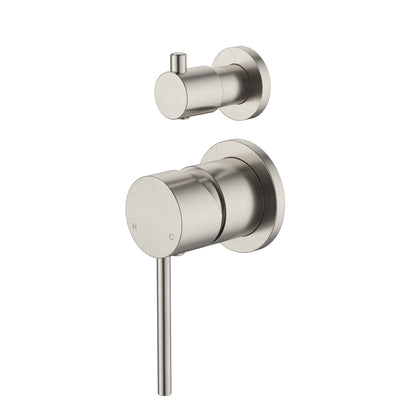 Stainless steel shower control panel on a white background